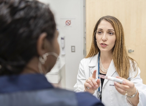 Doctor talking with patient